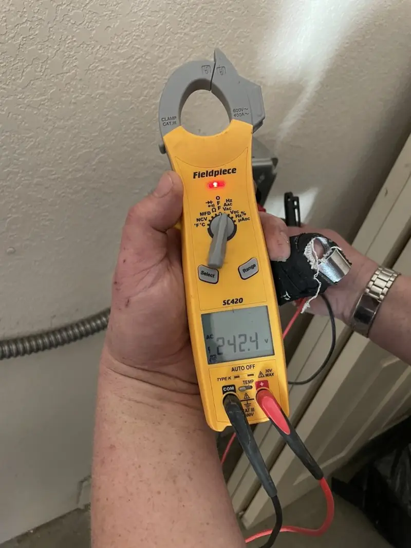 Voltage testing with clamp meter during Generator Installation in Indiana